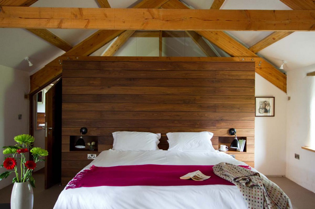 Beams in bedroom at Avallen Barn luxury holiday cottage near Helford