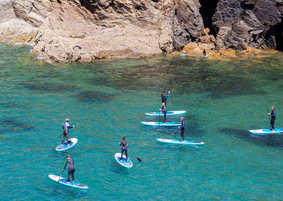 Port Gaverne Stand up paddleboarding Rock tors